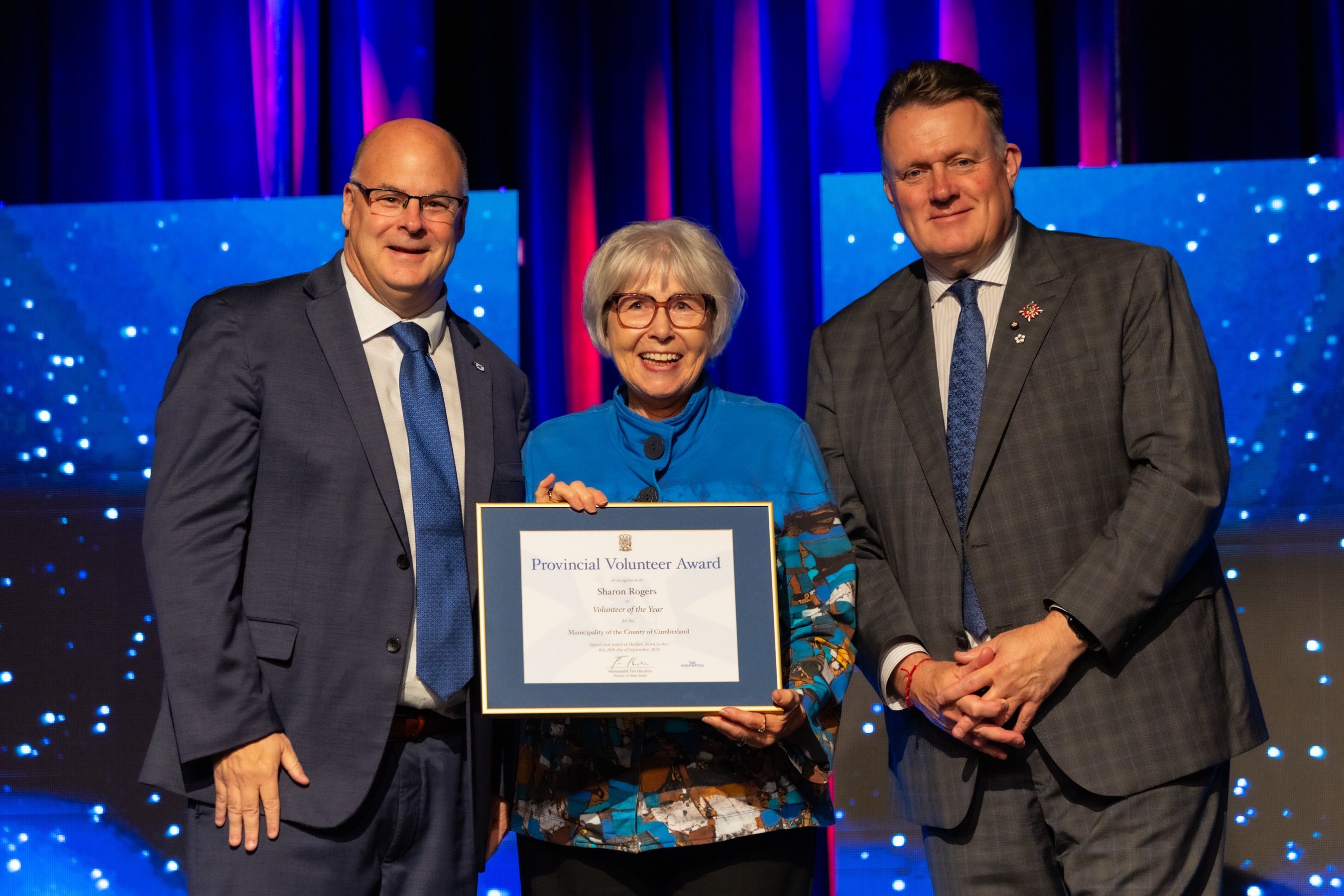 Sharon Rogers is recognized by Dave Ritcey (left), Minister Responsible for the Volunteer Sector, and Lt. Gov. Mike Savage at the Provincial Volunteer Awards ceremony in Halifax on Sept. 28. Communications NS photo